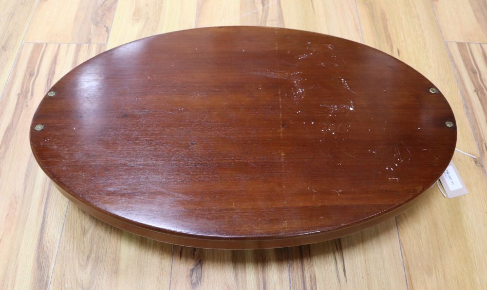 An oval wooden tray fitted brass handles, 62cm